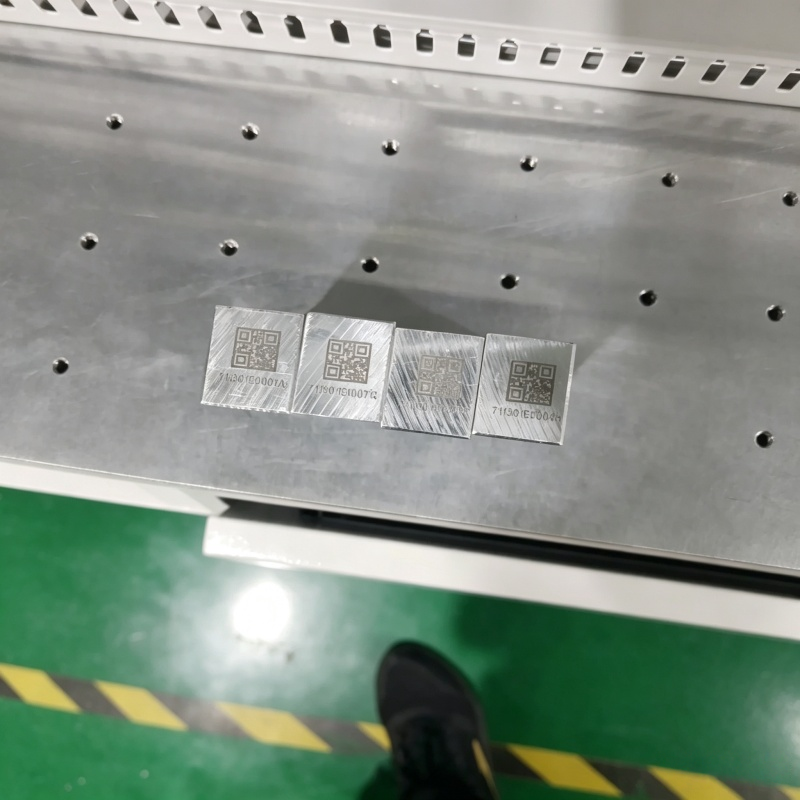 Steel component marked with a fiber laser