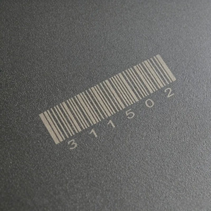 QR code and barcode marked with a UV laser