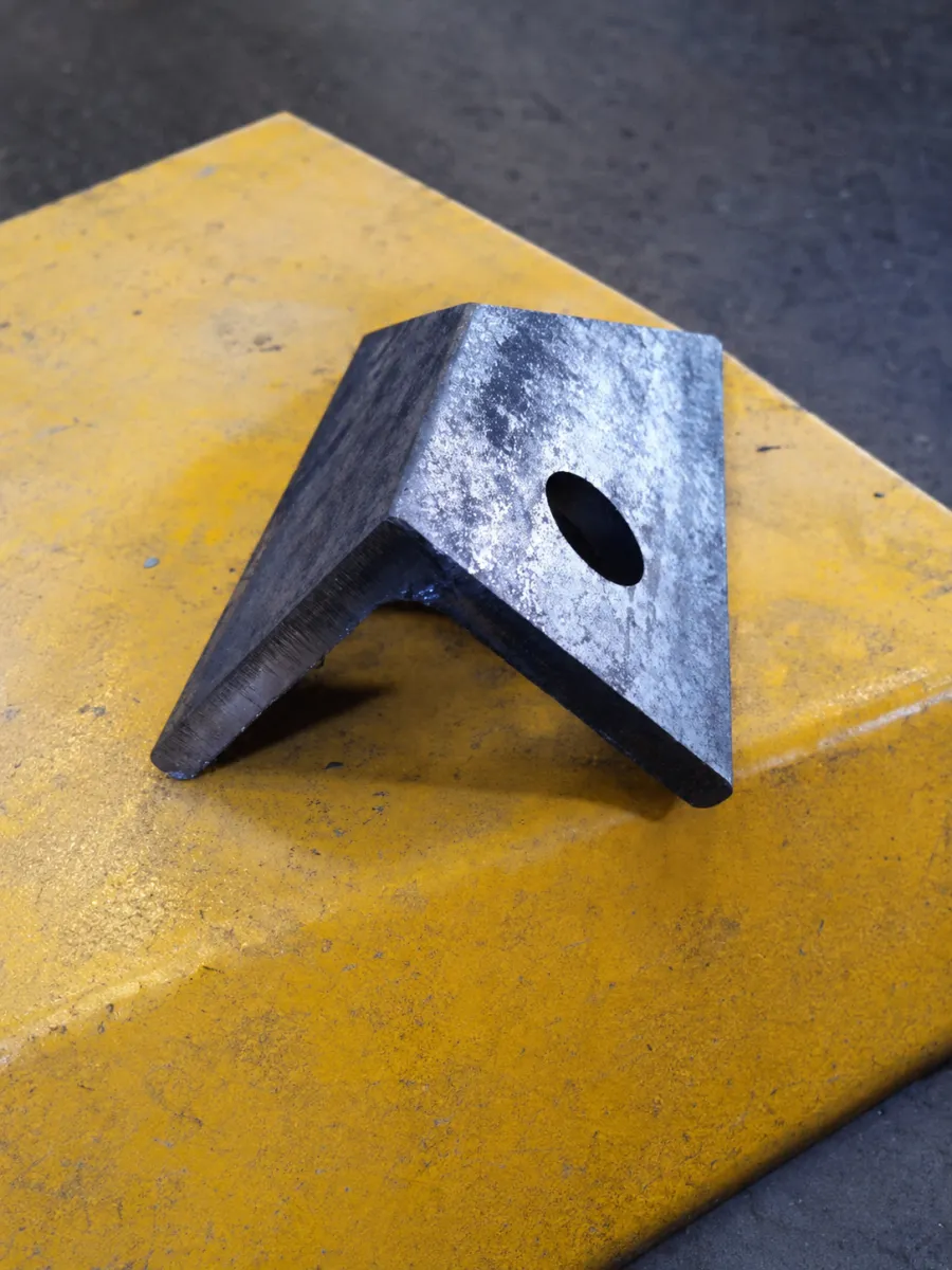 Laser-cut part from a tube and sheet laser cutting machine